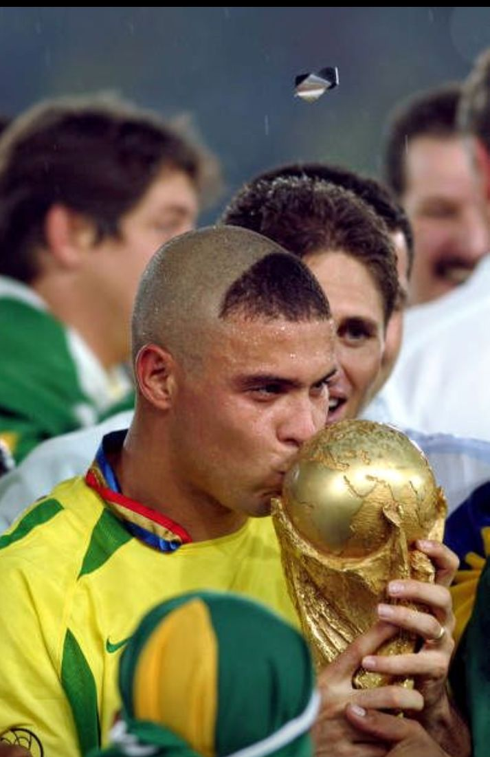 Ronaldo with the 2002 World Cup trophy