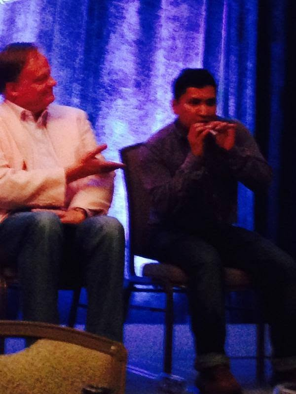 Sharing the stage with Jim during an offsite fun event